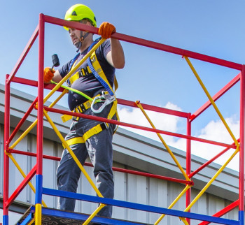 What influences the height of a mobile scaffolding tower?